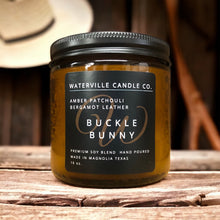 Load image into Gallery viewer, Buckle Bunny 16oz Amber Jar Candle
